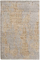 Close-up of the Nourison Harmony Grey Gold rug showing its abstract pattern and textured wool and rayon blend.