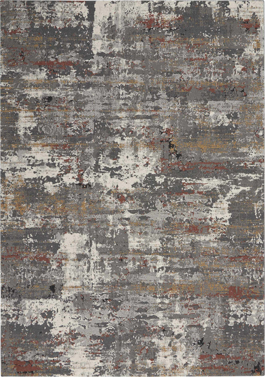 Close-up of the Nourison Tangra Grey Multicolor rug. Features an abstract pattern in gray, white, gold, and red hues.