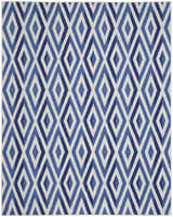 Close-up of the Nourison Whimsicle Ivory Blue rug featuring a diamond pattern in shades of blue and white.