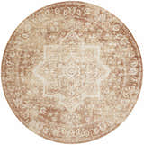 Close-up of the round Nourison Astra Rust Vintage rug. Features a detailed floral and star pattern in rust and beige tones.