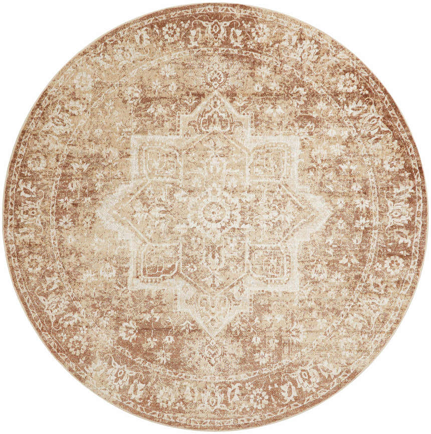 Close-up of the round Nourison Astra Rust Vintage rug. Features a detailed floral and star pattern in rust and beige tones.