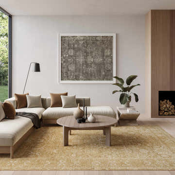 Modern living room with a Nourison Moonlit Taupe Vintage Indoor Area Rug, sectional sofa, and round wood coffee table.
