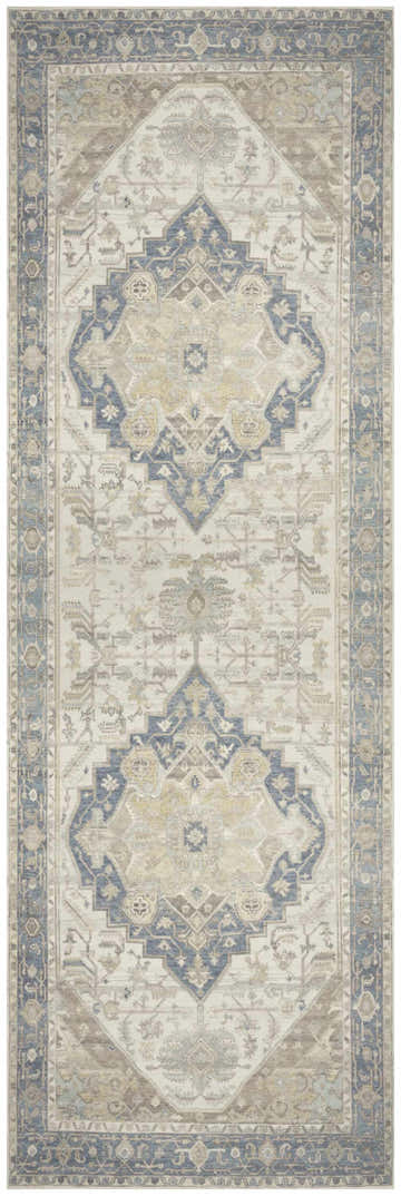 Close-up of Nourison Vintage Blue Green rug. Vintage style rug with blue, green, and beige intricate patterns.