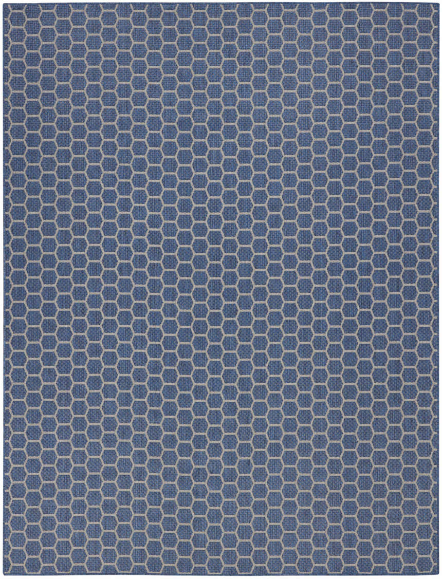 Close-up of the Nourison Twist Reversible Blue Area Rug, featuring a modern geometric honeycomb pattern.