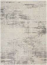 Close-up of the Calvin Klein CK950 Rush Ivory Beige Rug. Features a distressed, abstract pattern in ivory and beige tones.