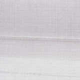 Close-up of the Calvin Klein Launder Ivory rug, showing its subtle texture and woven design. Washable area rug.