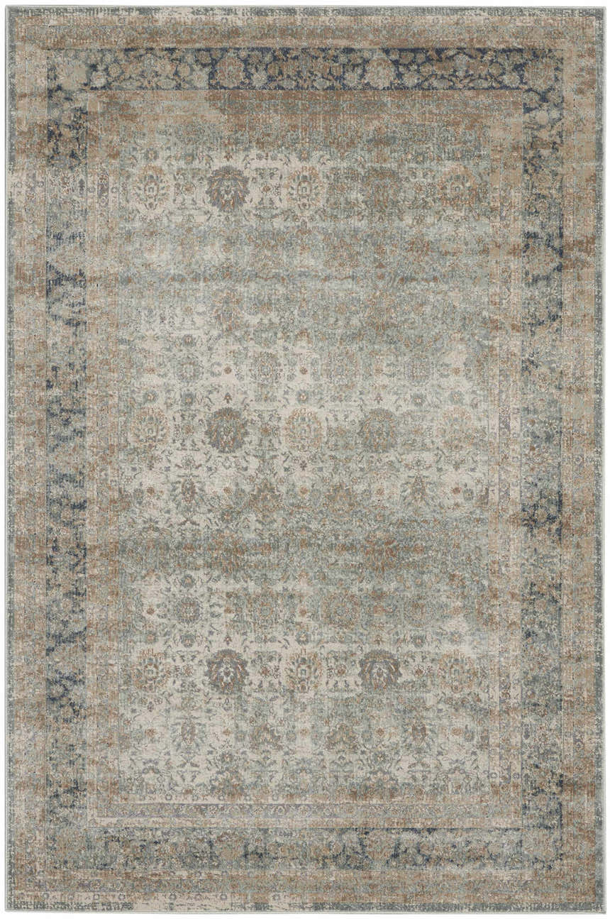 Close-up of the Nourison Malta Cloud Vintage Area Rug, featuring a distressed floral pattern in cloud, tan, and navy.