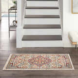 Entryway with Nourison Karisma Ivory rug, farmhouse style. Chestnut, red, and blue design on a neutral background.