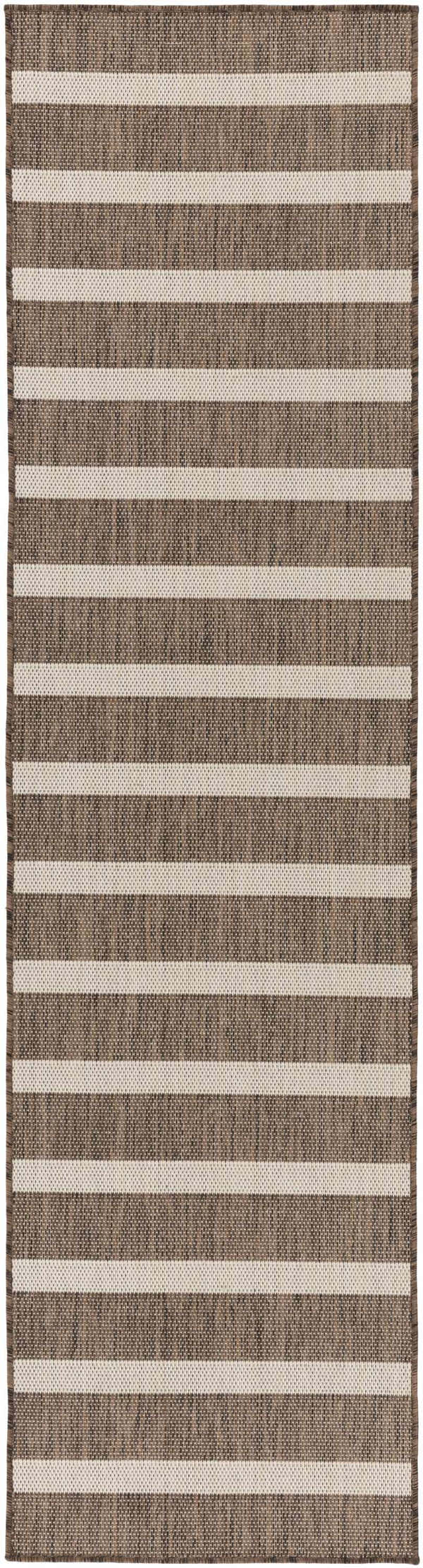 Close-up of Nourison Positano Natural Ivory Modern Area Rug with chestnut brown and ivory stripes.