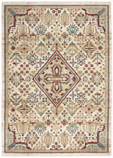Close-up of the Nourison Karisma Ivory rug. Farmhouse style with chestnut, red, and blue floral and geometric patterns.