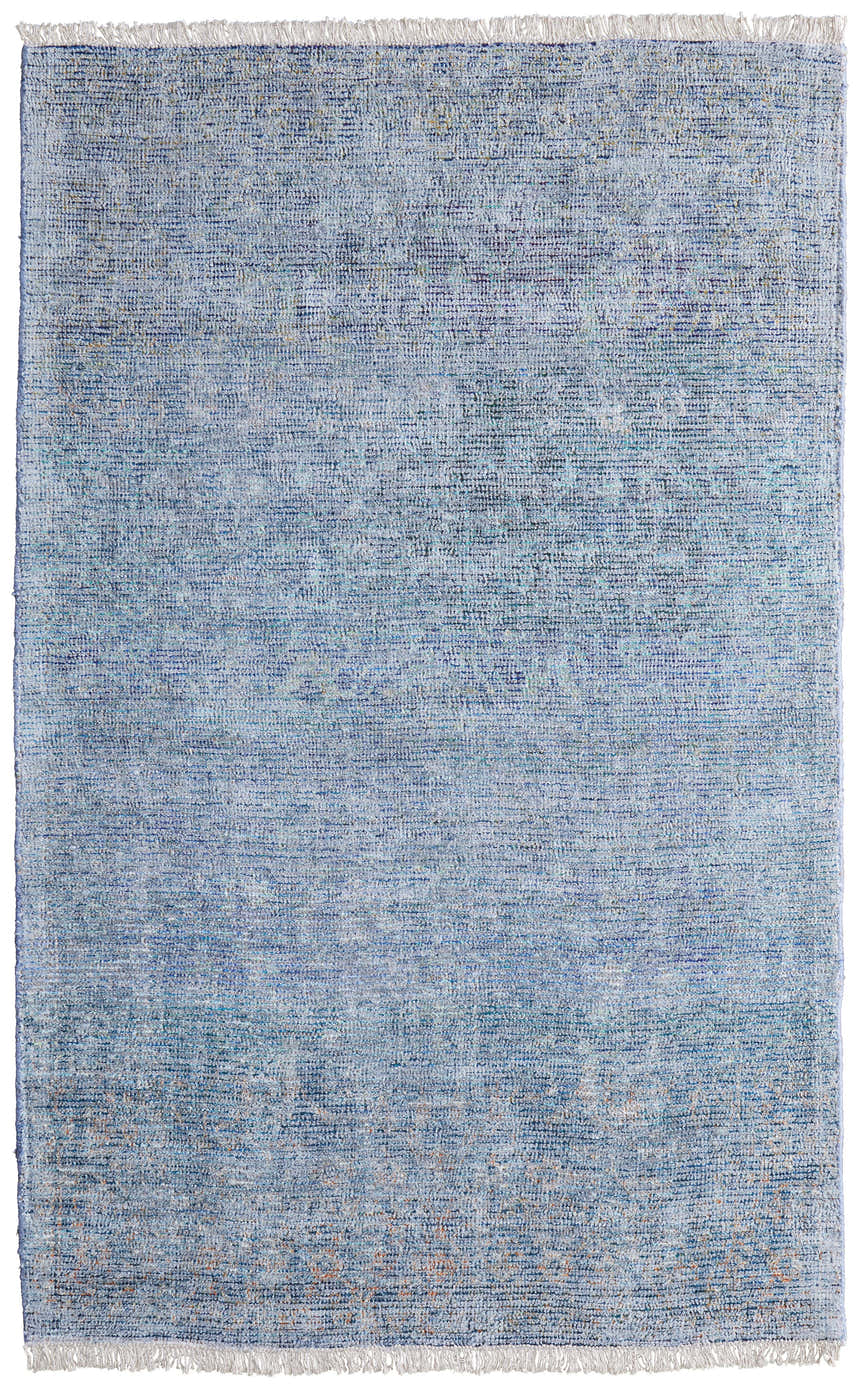 Close-up of the Feizy Caldwell rug. Blue and gray distressed pattern with a casual, transitional style. Hand-woven wool and viscose. Design-Rectangle