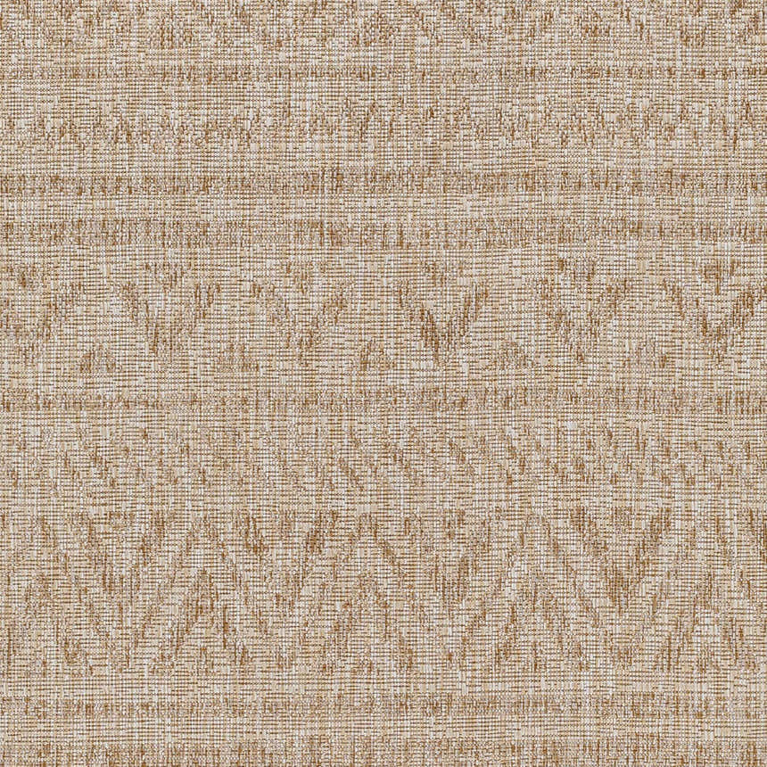 Close-up of the Vanderhoof Indoor & Outdoor Rug, showcasing its mocha and light peach bohemian pattern and woven texture. Texture