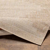 Close-up of the Djugun Beige Indoor & Outdoor Rug showing its woven texture and neutral beige and bone color palette. Fold