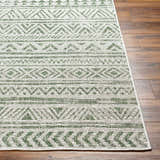 Close-up of Novato Olive All Over Pattern Performance Rug showing olive green geometric design and woven texture. Front