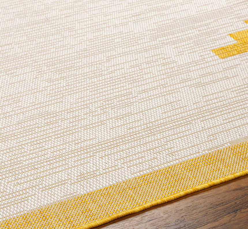 Close-up of Djugun Yellow Outdoor Rug showing beige, bone, and yellow geometric pattern and woven texture. Texture