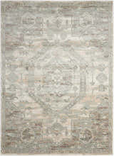 Close-up of the Nourison Euphoria Ivory Persian rug. Features a chestnut, gray, and ivory traditional pattern.