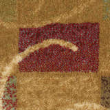 Close-up of the textured Nourison Expressions Beige rug with a red and beige geometric pattern.