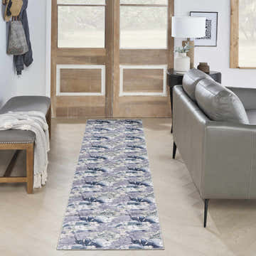 Hallway with grey sofa and Nourison Grey Blue Modern Indoor Washable Area Rug runner. Mid-century style.
