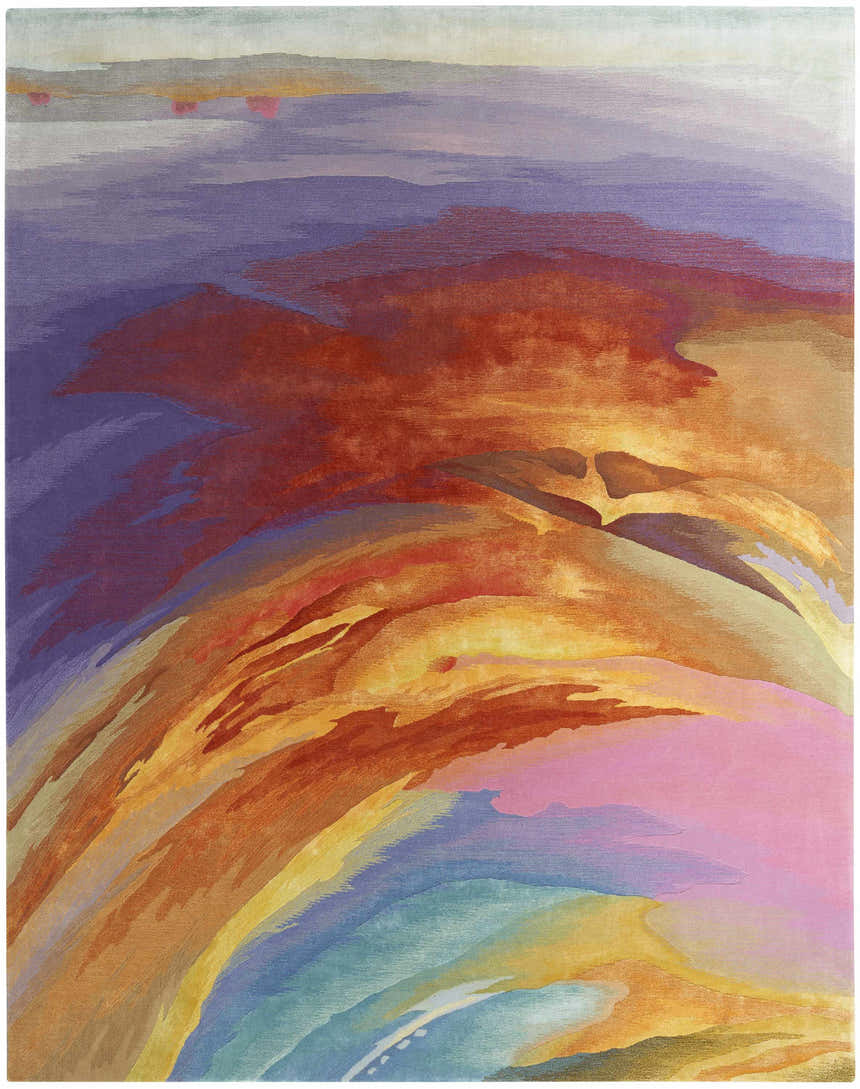 Close-up of the Nourison Prismatic Multicolor rug. Abstract design with shades of purple, orange, pink, blue, and yellow.