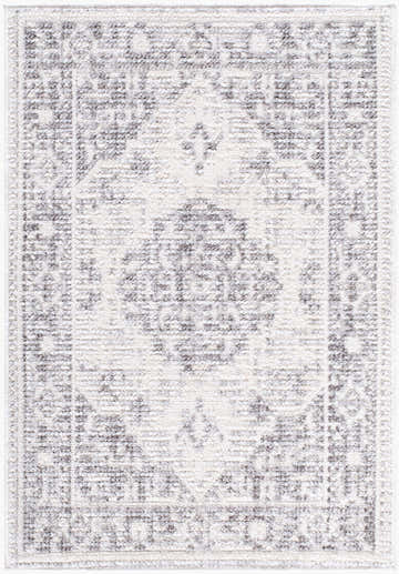 Close-up of Tufela Cream Medallion Rug. Machine woven polyester rug with charcoal, ivory, and gray medallion pattern. Design-Rectangle-221