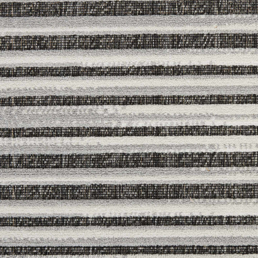 Close-up of the Nourison Key Largo Dark Grey rug showing a striped pattern and textured weave.