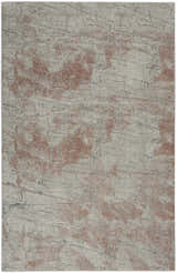 Close-up of Nourison Rustic Textures Light Grey Rust rug, showing abstract pattern and texture. Modern, mid-century style.