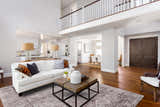 Living room with white sofa and Feizy Nadia Gray/Purple rug. Transitional style. Roomscene-Rectangle