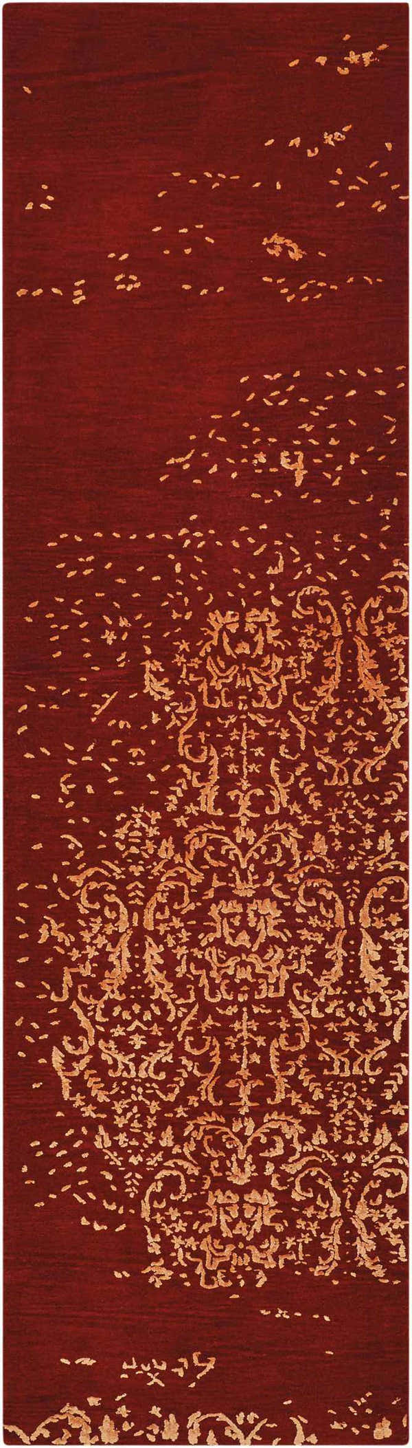 Close-up of Nourison Opaline Fire Vintage rug. Fire-colored wool rug with distressed gold floral design. Handmade runner.