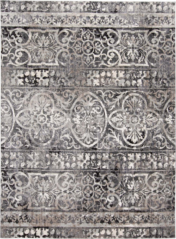 Close-up of the Feizy Kano rug. Transitional distressed design in gray, ivory, and taupe hues. Floral pattern. Design-Rectangle