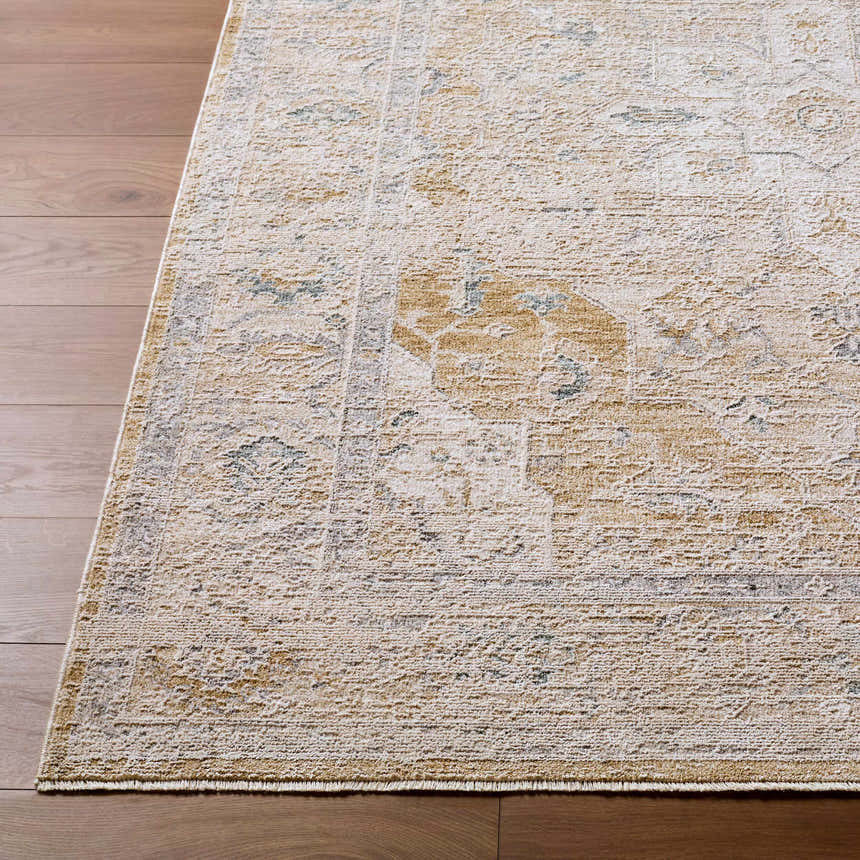 Close-up of Rhody Luxe Rug in light silver and sterling gray on wood floor. Traditional farmhouse style. Front