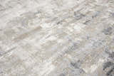 Close-up of the Rizzy EN7258 area rug. Beige, ivory, and gray abstract pattern. Contemporary style. Texture