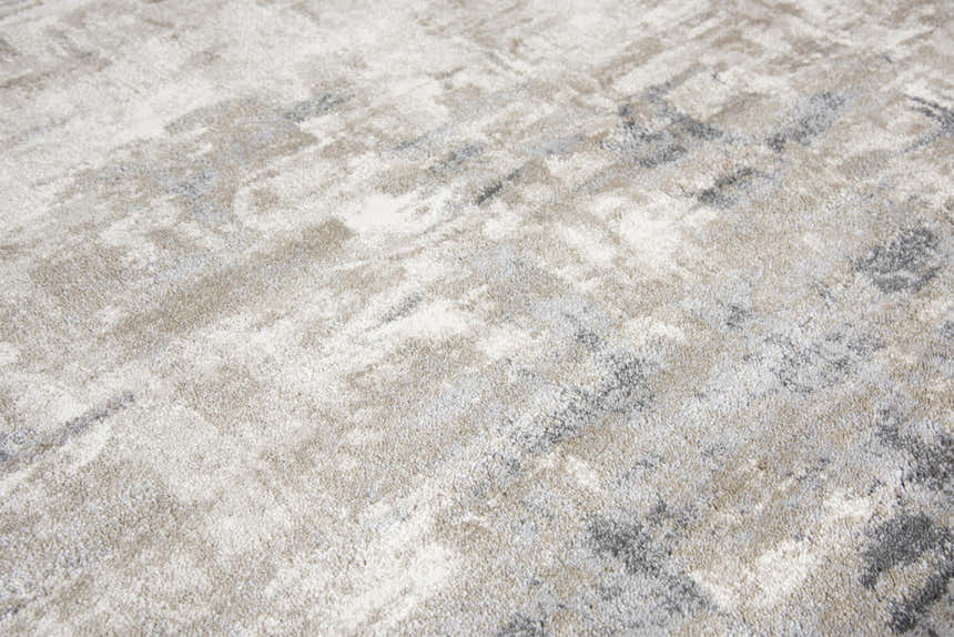 Close-up of the Rizzy EN7258 area rug. Beige, ivory, and gray abstract pattern. Contemporary style. Texture