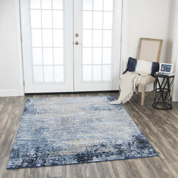 Transitional entryway with Rizzy EN7271 rug in blue, ivory, and black. Farmhouse style chair and white French doors. Roomscene-Rectangle