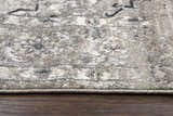 Close up of the Rizzy EN7351 area rug showing the traditional pattern, burnt orange, and gray tones. Pile