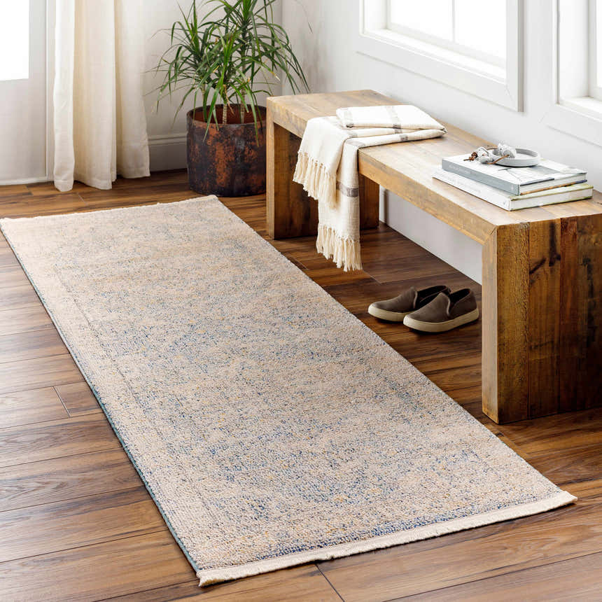 Entryway scene with a Tusa Blue Area Rug runner, wood bench, plant, and natural light. Roomscene-Runner