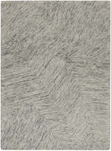 Close-up of the DKNY Pure Angles Grey rug. Modern design with gray angles and linear texture. Handmade pile rug.
