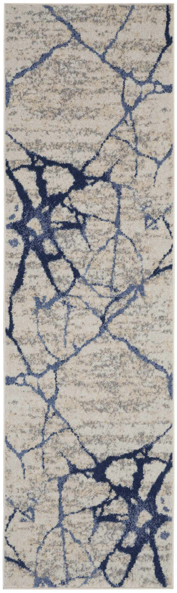 Close-up of Calvin Klein River Flow rug; ivory, blue abstract pattern. Modern, machine-made polypropylene rug.