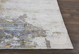 Close-up of Nourison Safari Dreams Ivory Gold Painterly Rug showing painterly chestnut, gold, and blue design.