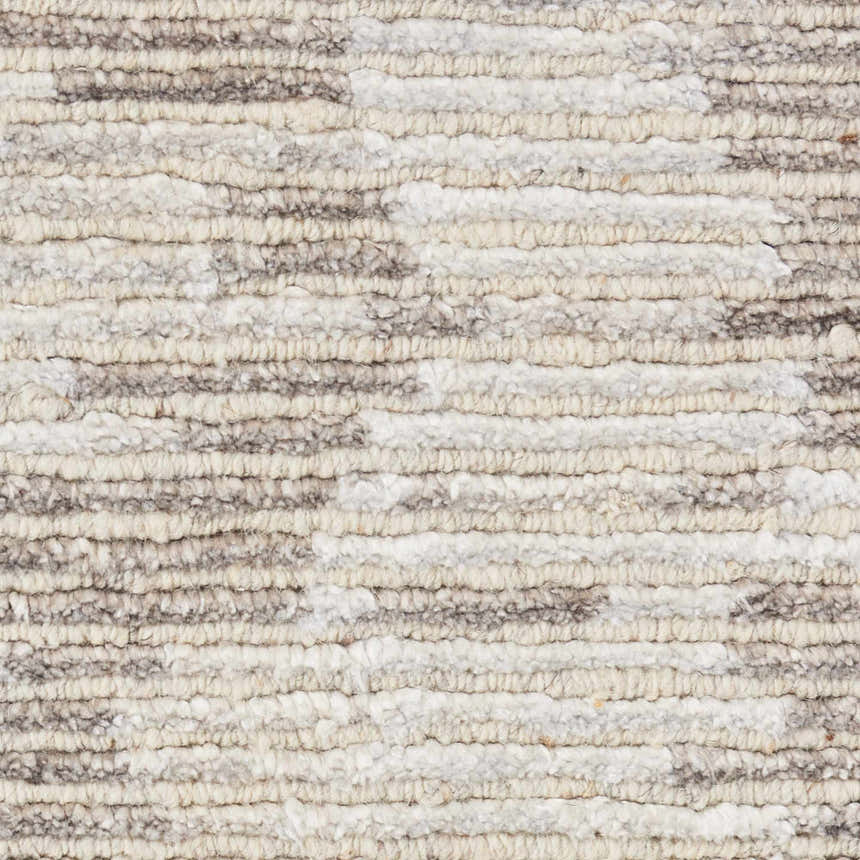 Close up of the ivory and grey textured design of the Nourison Ellora Area Rug.