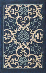Close-up of the Nourison Caribbean Navy Contemporary Area Rug featuring a floral and scroll pattern in navy, cream, and light blue.