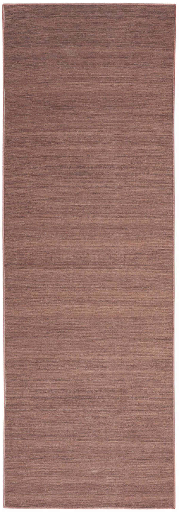 Close-up of the Nourison Essentials Mocha rug. Light brown, machine-made, modern style.