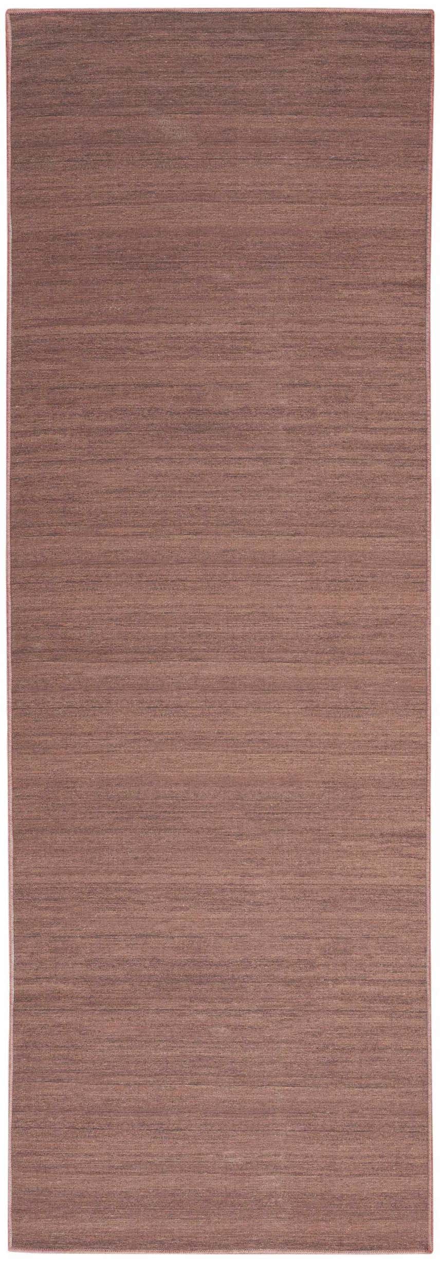 Close-up of the Nourison Essentials Mocha rug. Light brown, machine-made, modern style.