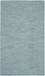 Close-up of the Nourison Positano Aqua Modern Area Rug featuring a grid pattern in light blue and white.