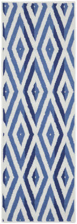 Close-up of the Nourison Whimsicle Ivory Blue rug. Features a modern diamond pattern in shades of blue on an ivory background.
