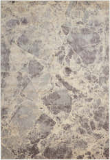 Close-up of the Nourison Somerset Grey rug, featuring a modern, abstract pattern in shades of gray, taupe, and cream.
