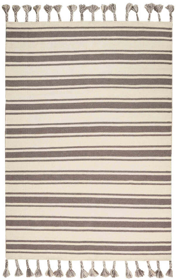 Close-up of the handmade Nourison Rio Vista rug with chestnut stripes and tasseled edges. Wool material.