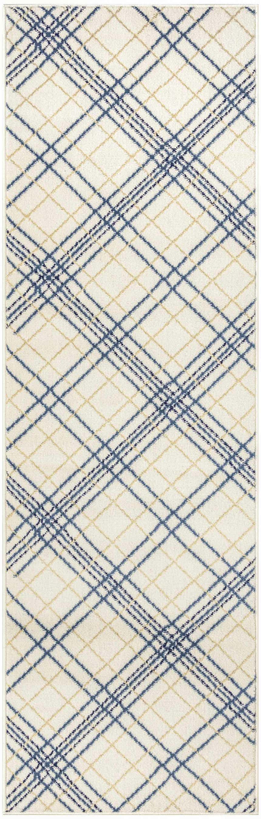 Close-up of Nourison Jubilant Ivory Navy rug. Farmhouse style with chestnut and navy plaid pattern on a soft ivory background.