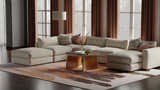 Living room scene with a Feizy Anya red, brown, and orange abstract rug under a sectional sofa and round coffee table. Roomscene-Rectangle
