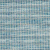 Close-up of the Nourison Positano Aqua rug, showing its woven texture and grid-like pattern in shades of blue and white.