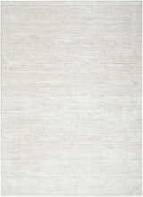 Close-up of the Nourison Dew Ivory Beige rug showing its subtle, textured low pile and modern design.